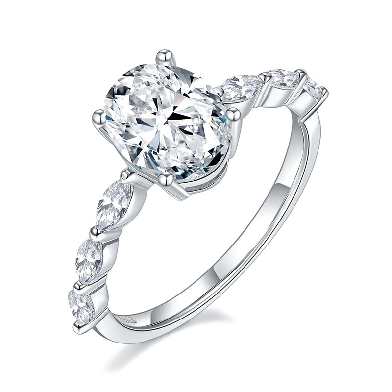 Side Stone Oval 4 Claw Moissanite Engagement Ring